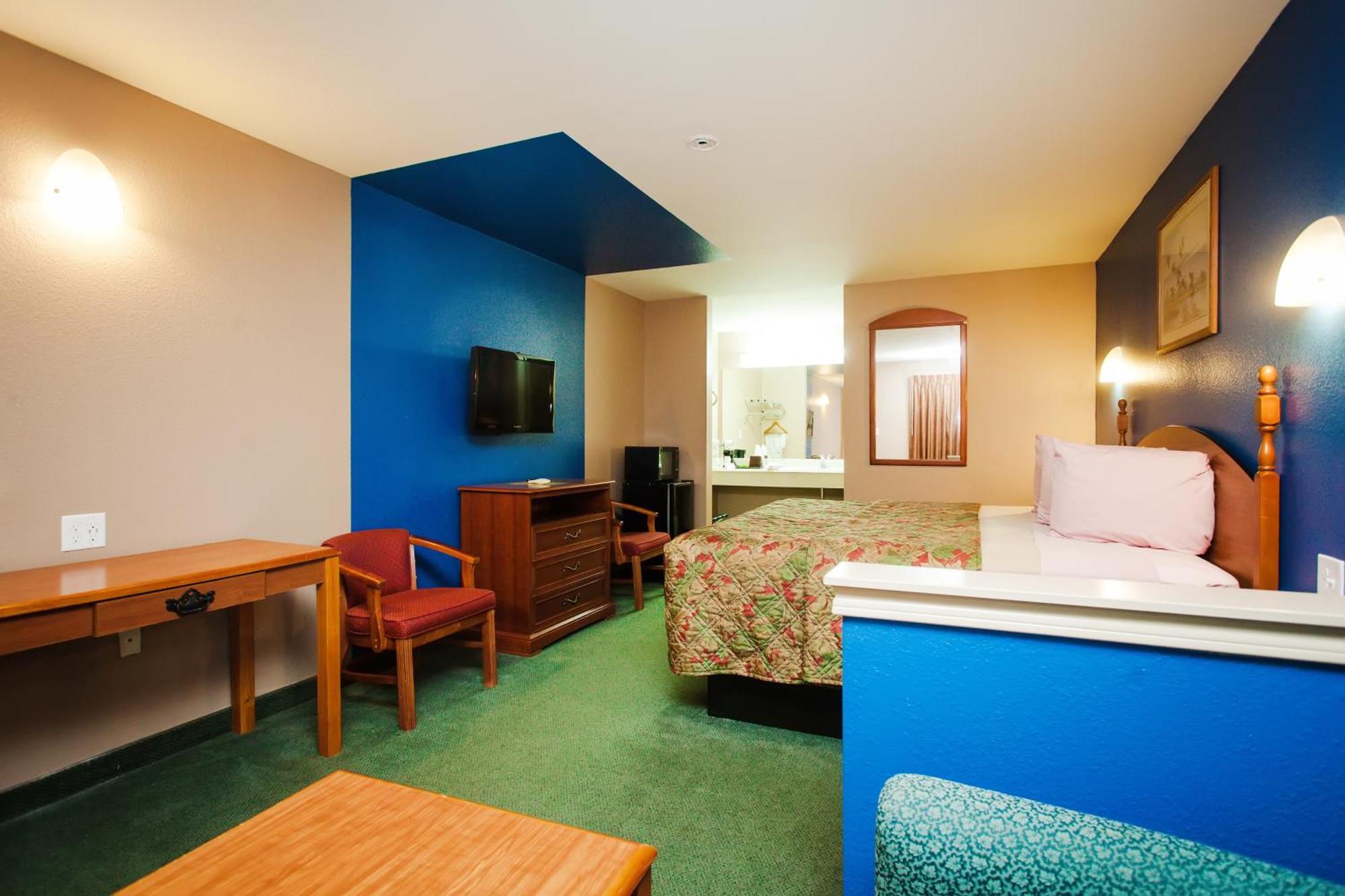 Scottish Inn & Suites Hankamer Quarto foto