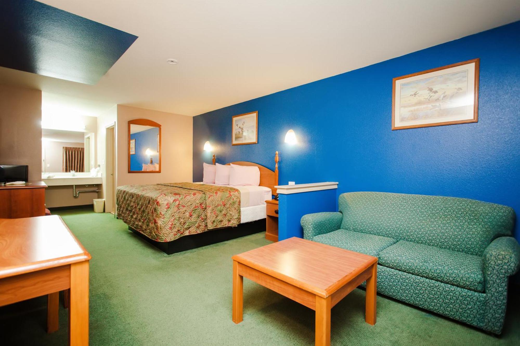Scottish Inn & Suites Hankamer Quarto foto